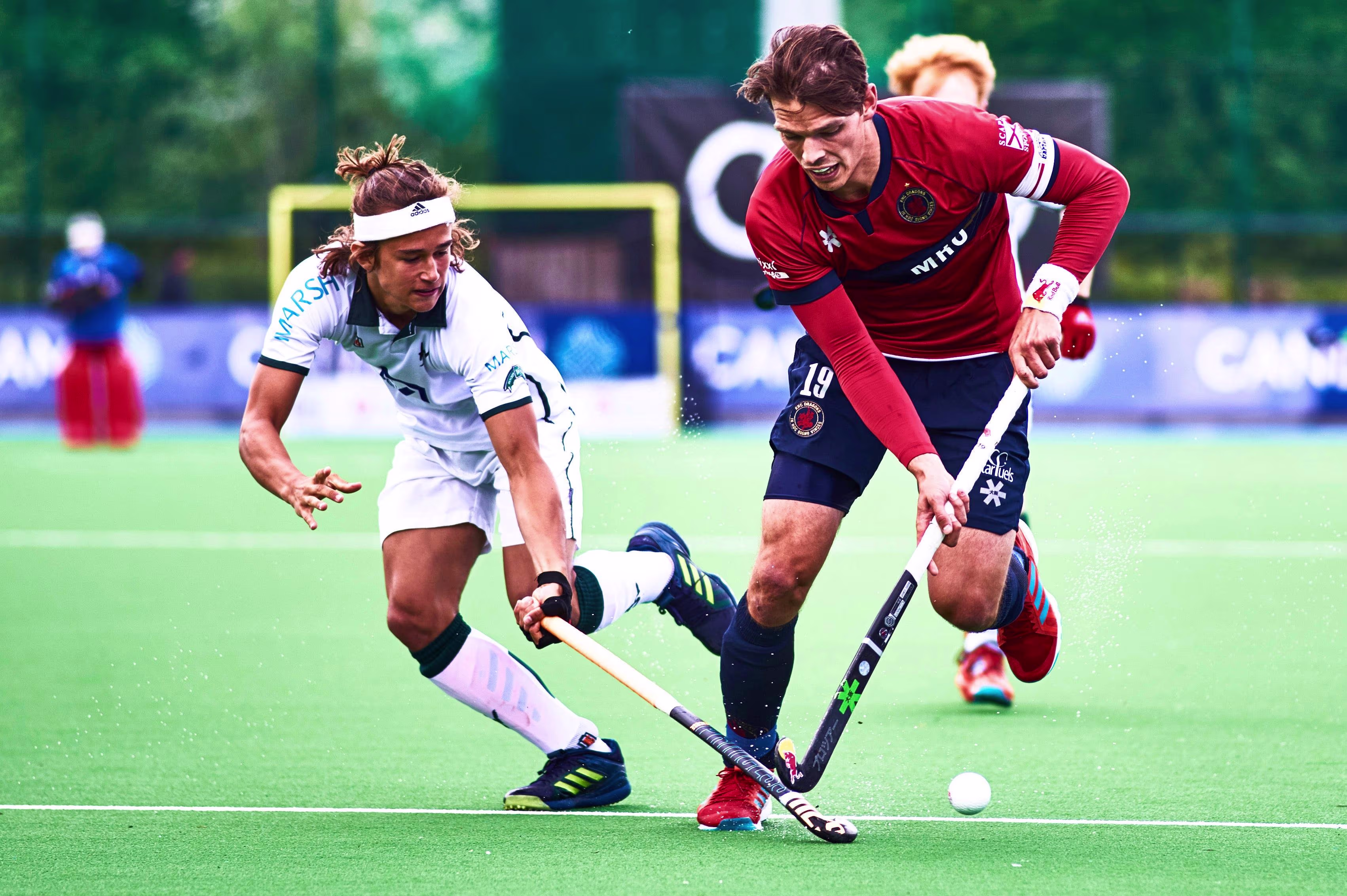 Hockey players in a match situation